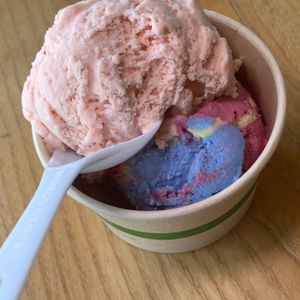 Vegan Blood Orange Mango & Vegan Superhuman.  The flavors of Superhuman are Lemongrass, Lemon, and Cherry, and the vibrant colors are made from Beetroot, Spirulina, and Turmeric at Love's Ice Cream - Downtown Market in Grand Rapids