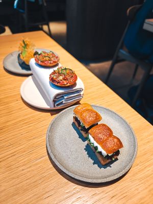 Fingers foods: beetroot, redonion and creme fraîche on toast; tomato, oregano and red currant pie; sunchoke, horseradish and griller pear tartlet at Grön Restaurant in Helsinki