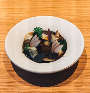Variation of mushrooms and cep mushroom consommé at Grön Restaurant in Helsinki