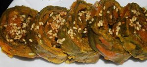 Alu Wadi - Taro leave interleaved with chick pea flour, tarmarind and tempered with linseed. Great VEGAN item with a tangy taste! at Saattveek in Auckland