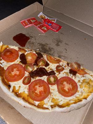 Vegan cheese and tomato at Piola in Playa Del Carmen