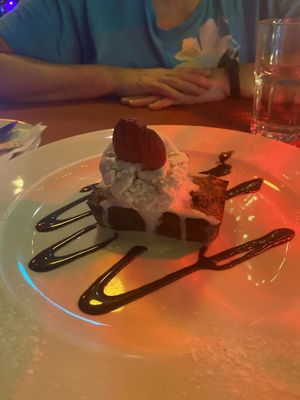 Vegan Banana: banana bread topped with vanilla ice cream and strawberries   at Piola in Playa Del Carmen