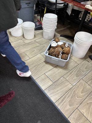 Cutting open fresh coconuts at Sri Ganesh's Dosa House in Jersey City