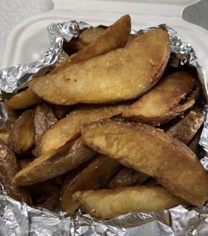 Overcooked potato wedges   at Reverie Cafe + Bar in Minneapolis