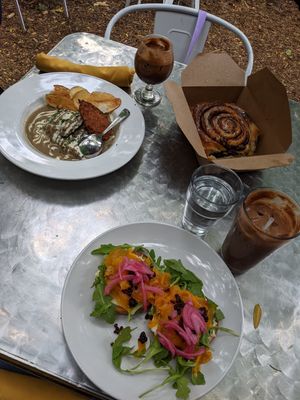 Goldielox bagel, biscuits & gravy, HUGE cinnamon roll. at Reverie Cafe + Bar in Minneapolis