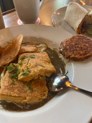 buscuits and gravy w housemade snausage  at Reverie Cafe + Bar in Minneapolis