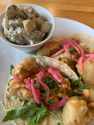 cauli tacossss and potat salad  at Reverie Cafe + Bar in Minneapolis