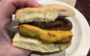 Sausage Biscuit Sandwich with Herbivorous Butcher Sausage at Reverie Cafe + Bar in Minneapolis