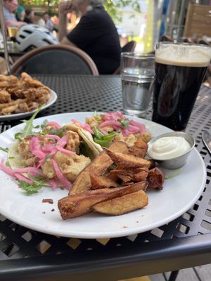 Cauliflower tacos with potato wedges   at Reverie Cafe + Bar in Minneapolis