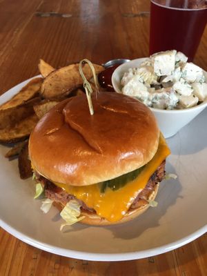 Curbside Burger. The house-made patty & fixins' are delicious to the last bite. at Reverie Cafe + Bar in Minneapolis