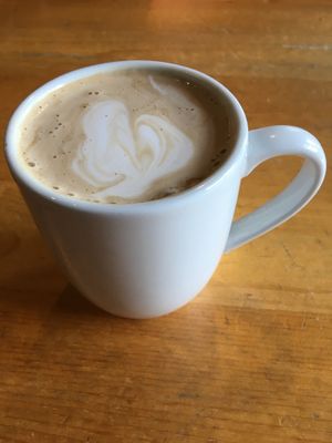 Decaf Latte with house cashew macadamia milk. at Reverie Cafe + Bar in Minneapolis