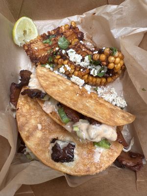 Chili Crisp Burnt End Tacos w/ Smoked Corn Ribs. Vegan chef challenge 2025. It’s soooo good. Some of the best food I’ve had here ever!   at Reverie Cafe + Bar in Minneapolis