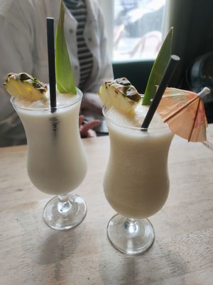 Pina coladas, one veggie (L), one vegan (R) at Lucky Pig - Paradise Palms in Edinburgh