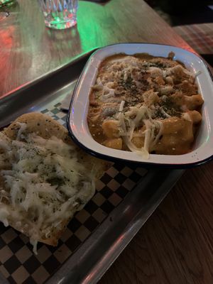 Mac and cheese with garlic bread. They didn’t question our Canadian request for ketchup to eat on it. It was good but not great.   at Lucky Pig - Paradise Palms in Edinburgh