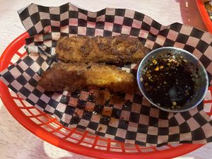 Ate one already - delicious and crispy  at Lucky Pig - Paradise Palms in Edinburgh