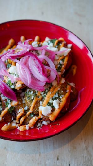 Smashed potatoes - gf, vegan, nut free   at Antojitos Cantina - Paradise Palms in Edinburgh