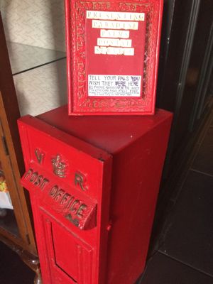 You can post their free postcards from here for £1 worldwide  at Lucky Pig - Paradise Palms in Edinburgh