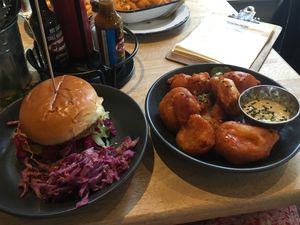 Schnitzel burger and buffalo cauliflower  at Lucky Pig - Paradise Palms in Edinburgh