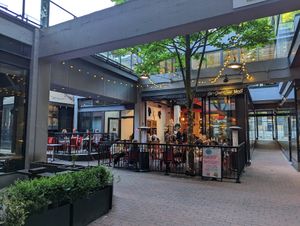 Indoor and outdoor seating, set back from main street at MeeT in Gastown in Vancouver