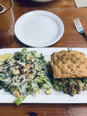 Pesto chicken sandwich with upgraded caesar salad  at MeeT in Gastown in Vancouver