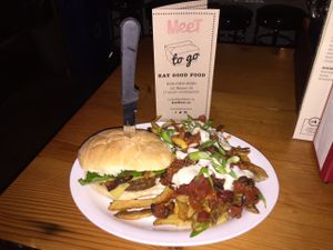 it hurt to breath after this burger and chilli fry combo! at MeeT in Gastown in Vancouver