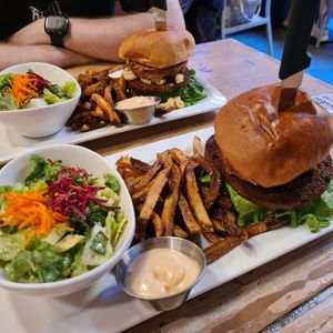 Mighty Mac burger and Meet burger with fries and salad at MeeT in Gastown in Vancouver