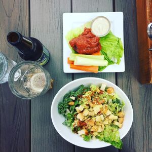 Kale Caesar Salad and vegan chicken wings at MeeT in Gastown in Vancouver