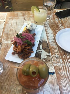 Delicious oyster mushroom calamari with margarita and vegan Caesar  at MeeT in Gastown in Vancouver