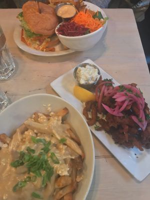Vegan poutine, burger and mushrooms calamari  at MeeT in Gastown in Vancouver