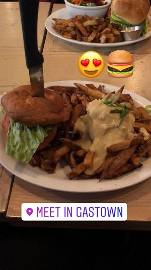 Burger on gluten free bun with poutine!  at MeeT in Gastown in Vancouver