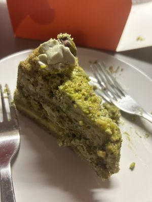Matcha and pistachio cake-It’s my fault it looks bad (I messed up when putting it on the plate) but taste was incredible   at Holigans in Vilnius