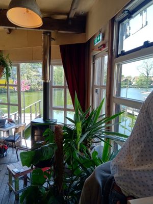 View of the water from inside at Cafe De Ceuvel in Amsterdam