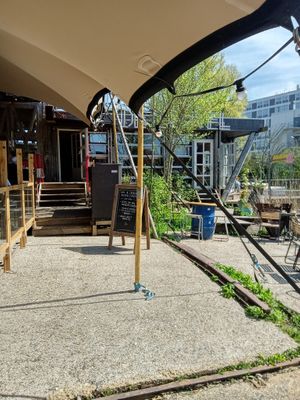 The entrance to the indoor area at Cafe De Ceuvel in Amsterdam