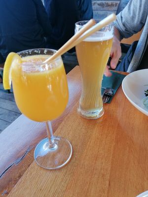 Mimosa and beer at Cafe De Ceuvel in Amsterdam