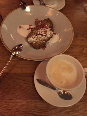 Vegan cake and Oatly cappuccino at Eetcafe Ceramique in Maastricht