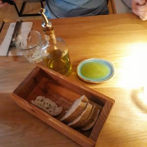 Bread and olive oil are served as an extra before the appetizer at Eetcafe Ceramique in Maastricht