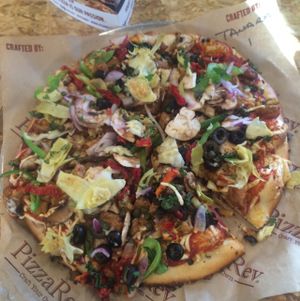 Vegan pizza (with vegan cheese & sausage) from Pizzarev at PizzaRev in Bakersfield