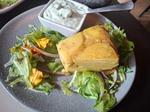 January 2026 - Spanish omelet skewer (minus the piece I ate!) at Samelo Veg in Tenerife