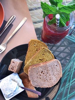 Artisan homemade bread and cold pressed red juice at Samelo Veg in Tenerife
