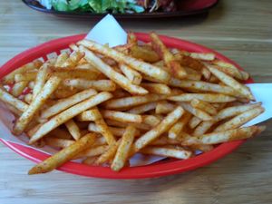 Fries with spicy seasoning at Trippy Taco  in St Kilda