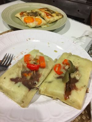 TAMALES "MUDOS" DE FRIJOLES MOLIDOS(FRONT) Y DE HONGOS(BACK) at Green Vurgers in San Jose