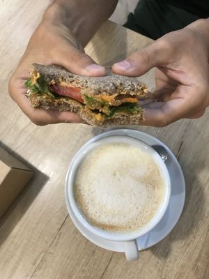 Hummus sandwich and herbal cappuccino  at BIOrganic Raw Cafe in Chisinau