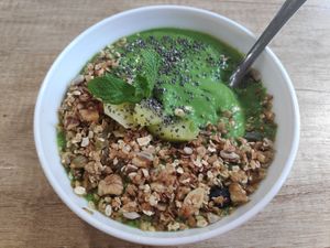 Green smoothie bowl for break fast at BIOrganic Raw Cafe in Chisinau