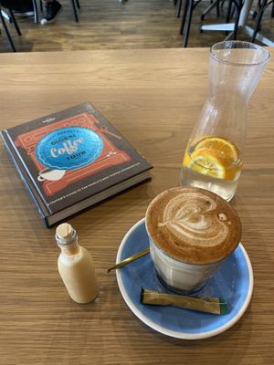 Ginger shot and coffee. at The Grind Coffee Company in Johannesburg