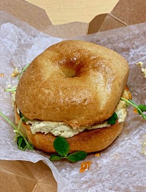 The ‘Vegan Monty’ bagel sandwich - it’s insanely good!!  at Ghostlight Coffee in Dayton