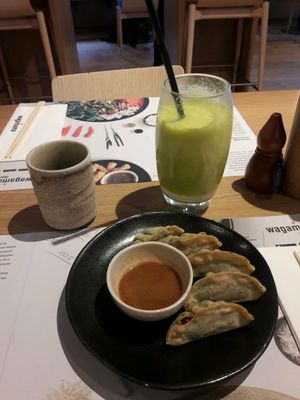 Dumplings, fresh juice and green tea at Wagamama in Frederiksberg