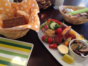 The 'das Große Vegan' vegan breakfast option. Different savory and sweet spreads, bread, veggies and fruit. at Cafe Behring in Berlin