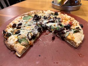  "build your own" personal pizza with spinach & kalamata olives at Portland Pie Company in Brunswick