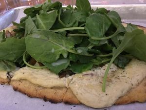 White truffle cashew cream arugula lemon vinaigrette gluten free pizza at Double Zero in New York City