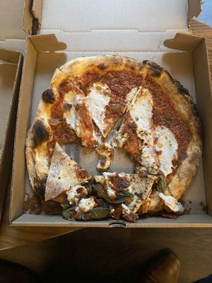 Pepperoni - driver delivered the pizza in a backpack vertically   at Double Zero in New York City